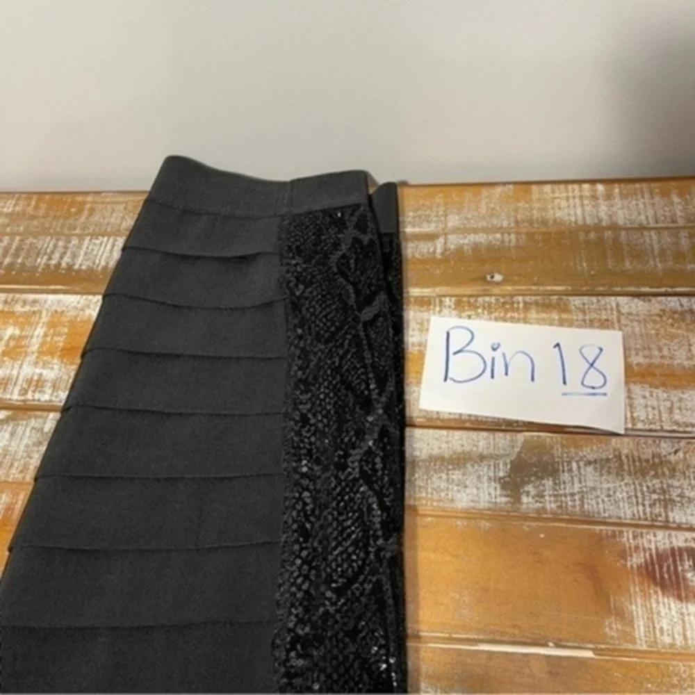 Tory Burch black mini bandage skirt with glitter side panels Size M